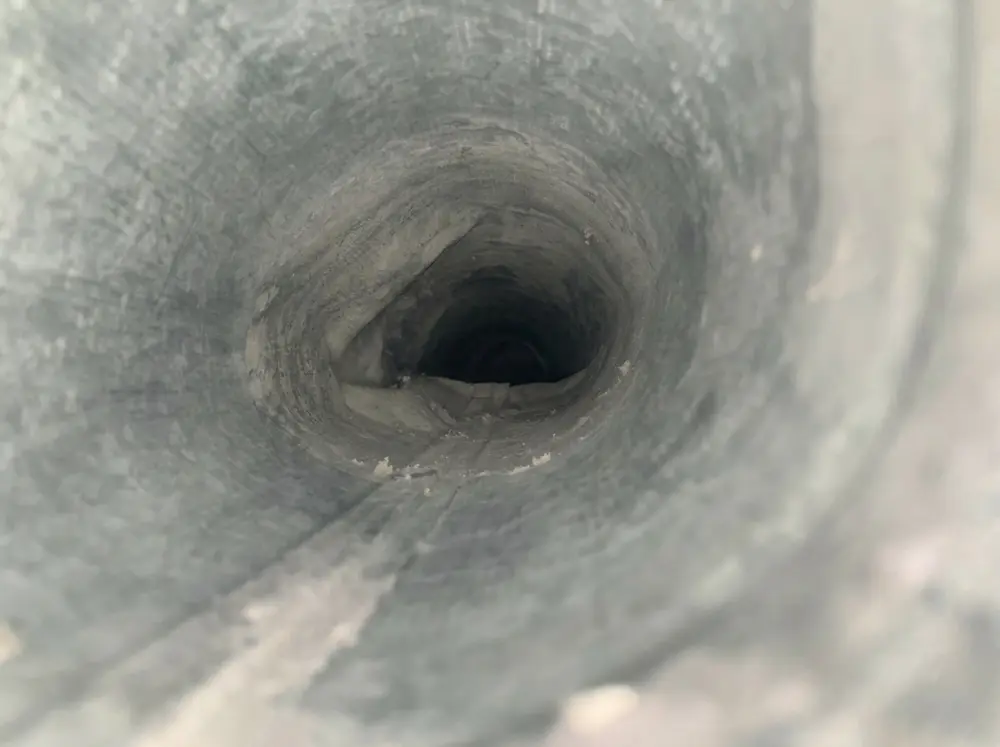 After round duct interior cleaning in Calgary