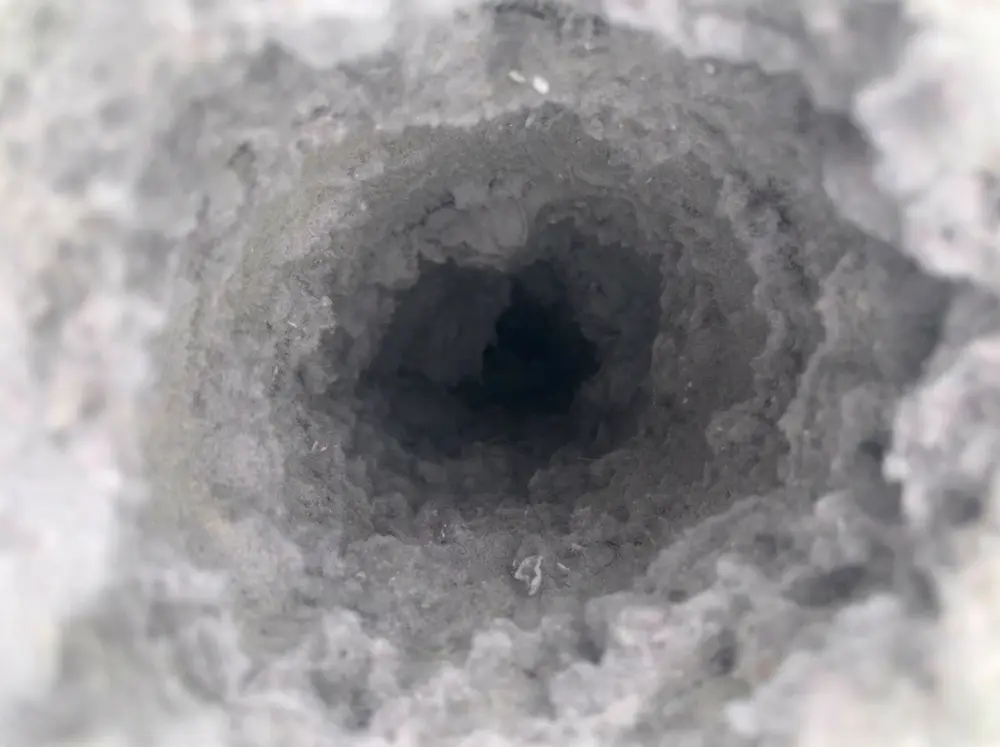 Before round duct interior cleaning in Calgary